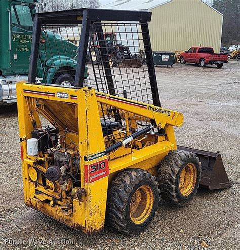 mustang 310 skid steer lift capacity|omc 310 skid steer specs.